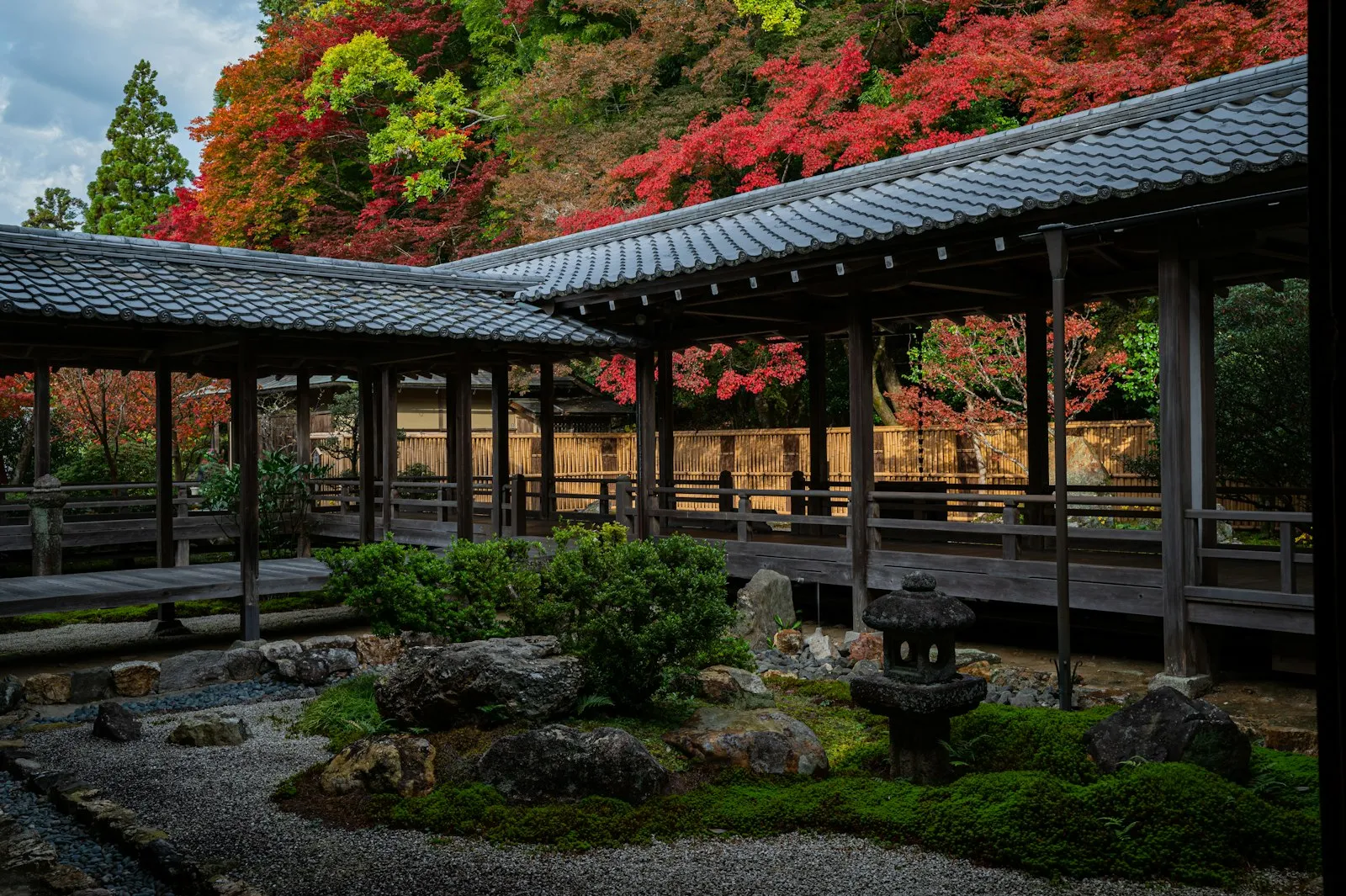 brown wooden gazebo near trees during daytime