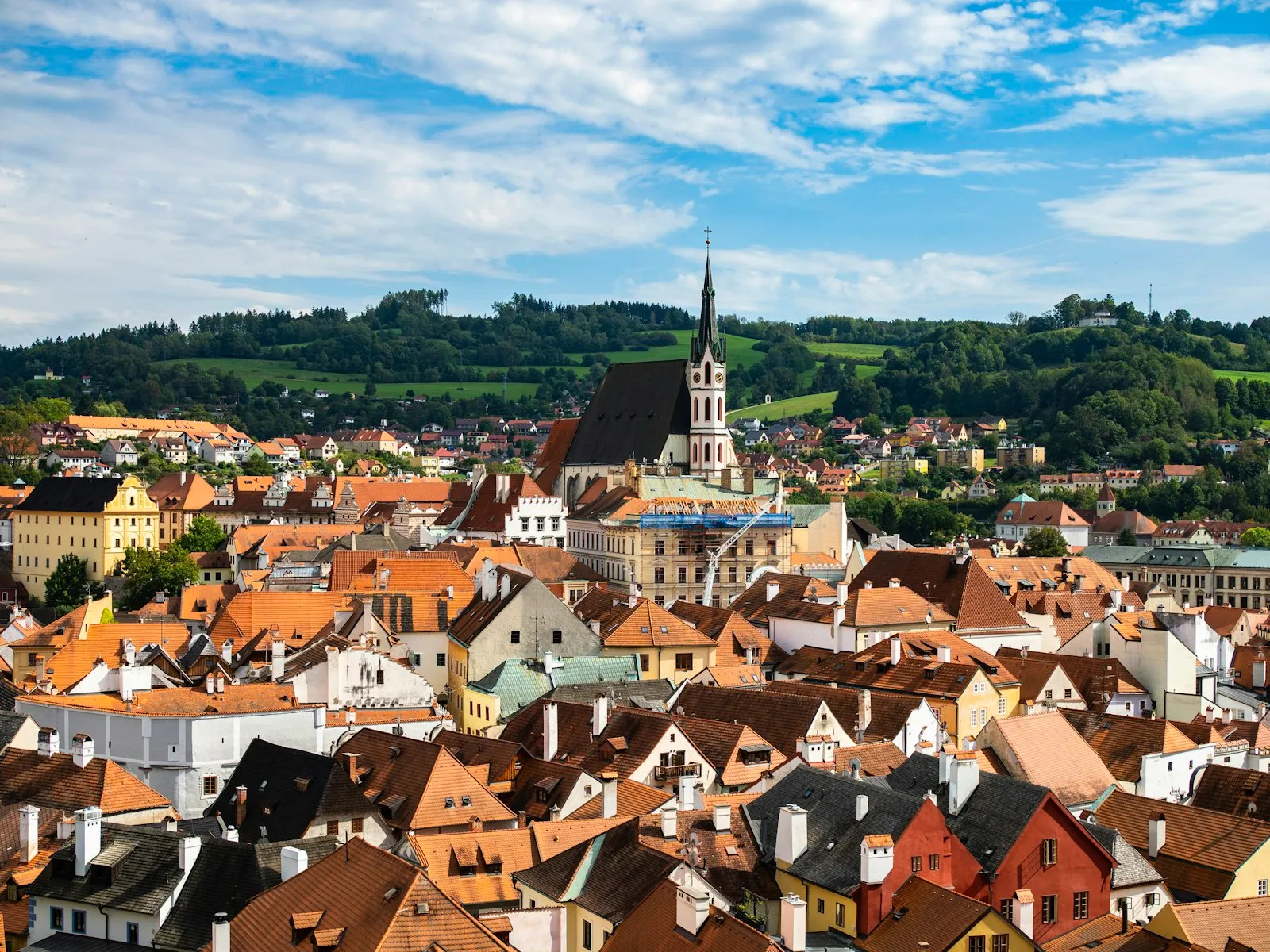 a view of a city from a hill